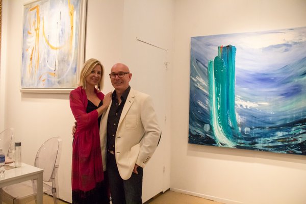 Lea Fisher and J.D. Miller in front of each of their work at the Samuel Lynne Galleries booth. MAGGY KILROY