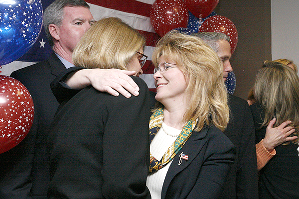 Linda Kabor hugs Nancy Graboski.
