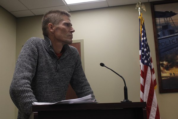 Simon Jorna, owner of the Beach Bakery and Cafe, at the Westhampton Beach Village meeting on Thursday. BY CAROL MORAN