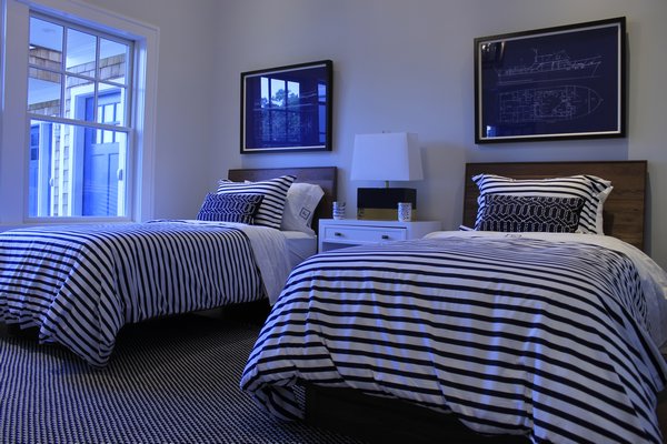 A bedroom inside a Ponquogue Point condo that was opened to the public on Friday, July 17. KYLE CAMPBELL