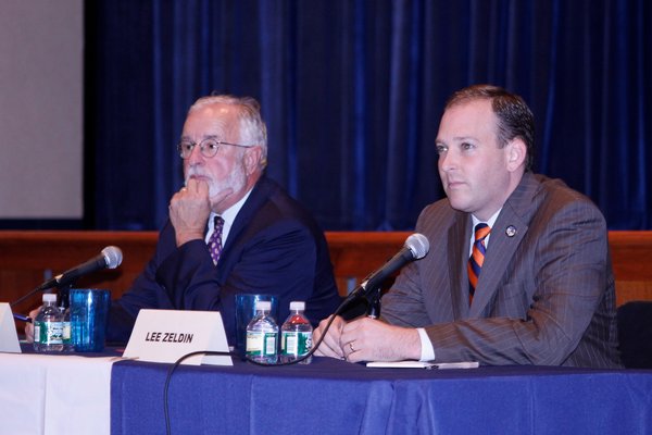 Congressman Tim Bishop, left, and State Senator Lee Zeldin during a debate at Westhampton Beach High School. KYLE CAMPBELL