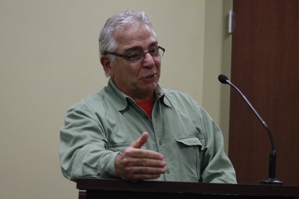 David Assalti, owner of 103 Main Street in Westhampton Beach, addresses the Village Board during its monthly meeting last week. KYLE CAMPBELL
