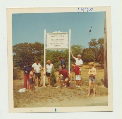 North Sea Beach Colony residents stand by their designated sign, circa 1970. NORTH SEA BEACH COLONY