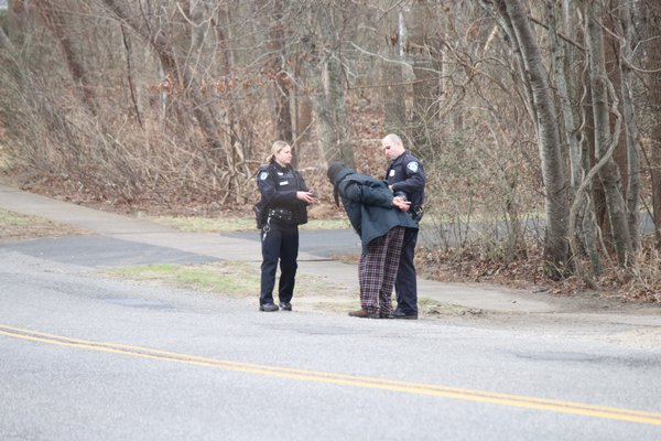 After an hourlong manhunt following reports of shots fired in an Oakview Highway home, East Hampton police officers apprehended a man nearby. Michael Wright