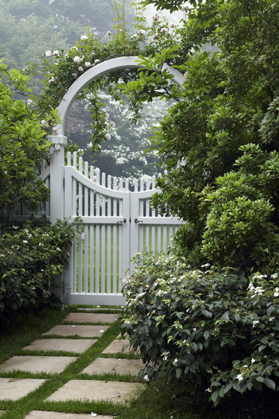 A gate placed inside the arbor announces that one is moving from the entry area of the garden to the more private part of the garden. PRINCIPAL PHOTOGRAPHY FOR "PRIVATE OASIS" BY CHARLES MAYER