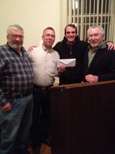 Members of the North Sea Lions Club presented a check for $1,000 to the North Sea Community Association, from funds raised during its annual Christmas Tree Sale, held last December. From left to right, Gene Scanlon, Secretary, NSL; Donald Oliver, Vice President, NSCA; William Sacher, President, NSCA; and Dick Nilsson, President, NSL.
