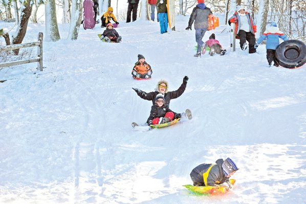 February 14: Children and adults took advantage of last weekend’s blizzard to get in some sledding in Hampton Bays on Saturday afternoon.