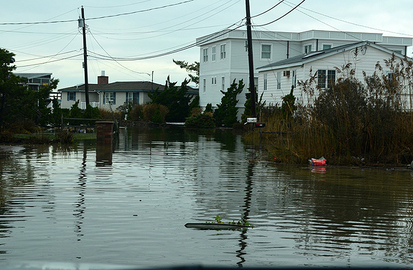 Hurricane Sandy caused considerable flood damage along Dune Road in Westhampton Beach. ERIN MCKINLEY