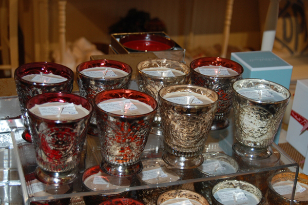 The Elegant Setting in Southampton sells various scented soy wax candles in mercury glass containers.