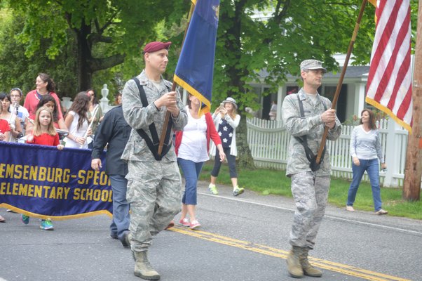 Air National Guard Major Sean Boughal and Captain Stewart Morrison, both residents of Remsenburg, lead marchers in the annual Remsenburg-Speonk Elementary School Memorial Day Parade on Friday, May 23. JENNIFER BIGORA