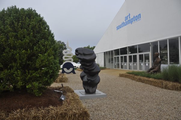 Landscape architect Christopher LaGuardia used hay bales to create planters outside Art Southampton. MICHELLE TRAURING