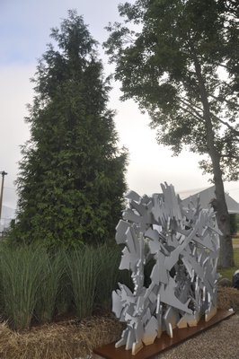 Landscape architect Christopher LaGuardia used hay bales to create planters outside Art Southampton. MICHELLE TRAURING