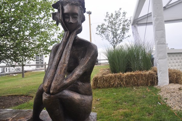 Landscape architect Christopher LaGuardia used hay bales to create planters outside Art Southampton. MICHELLE TRAURING