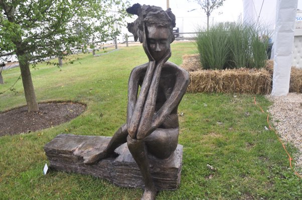 Landscape architect Christopher LaGuardia used hay bales to create planters outside Art Southampton. MICHELLE TRAURING