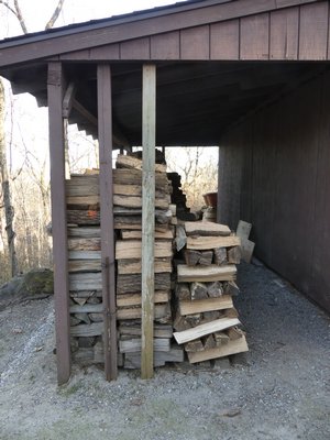 For long-term storage of firewood, a woodshed can’t be beat. This wood will last for years if it’s kept dry. You can find woodshed designs online or buy small ones prefabricated. ANDREW MESSINGER