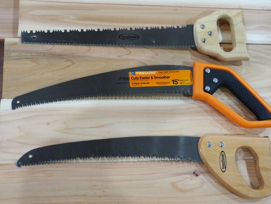 Three different 15-inch tree saws each with different tooth patterns. The two Green Thumb branded are ‘budget’ priced while the Fiskars is mid-priced and much sturdier. The hole at the end of each blade is for hanging the saw from a nail or hook. ANDREW MESSINGER