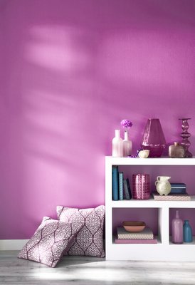 Pantone's 2014 Color of the Year, Radiant Orchid, is already being realized in fashion, housewares, interior design and furnishings. COURTESY DESSY DRESSES