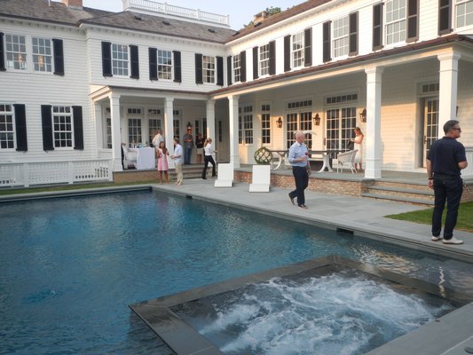 Corcoran broker Tim Davis hosted an open house party for his first spec house in Southampton Village on September 3. CAREY LONDON