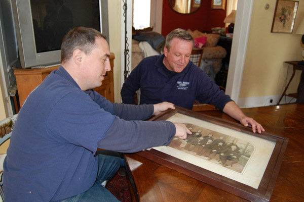 Jeremy Burke and Jim Maguire with a replica of the photograph Mr. Burke found.  DAWN WATSON