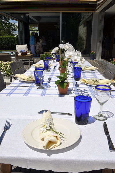 Outdoor dining at Stuart Disston's house on Assups Neck Lane in Quogue. MICHELLE TRAURING