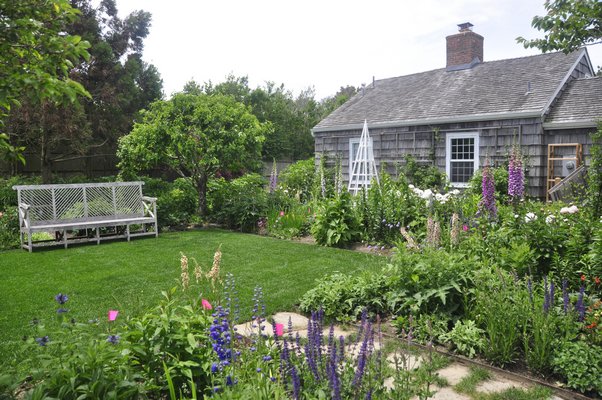 Scenes from Alexandra Munroe's and Robert Rosenkranz's garden in East Hampton. MICHELLE TRAURING