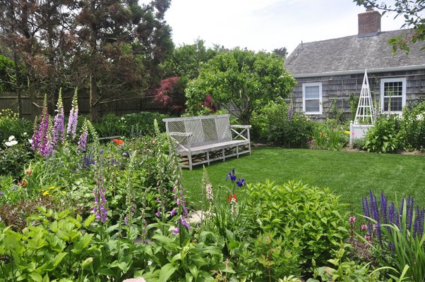 Scenes from Alexandra Munroe's and Robert Rosenkranz's garden in East Hampton. MICHELLE TRAURING