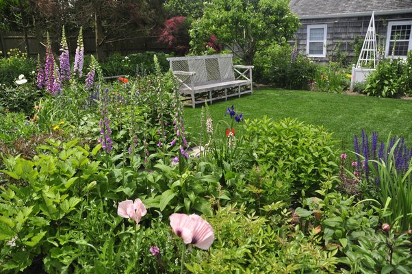 Scenes from Alexandra Munroe's and Robert Rosenkranz's garden in East Hampton. MICHELLE TRAURING