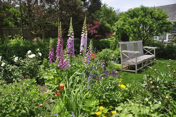 Scenes from Alexandra Munroe's and Robert Rosenkranz's garden in East Hampton. MICHELLE TRAURING