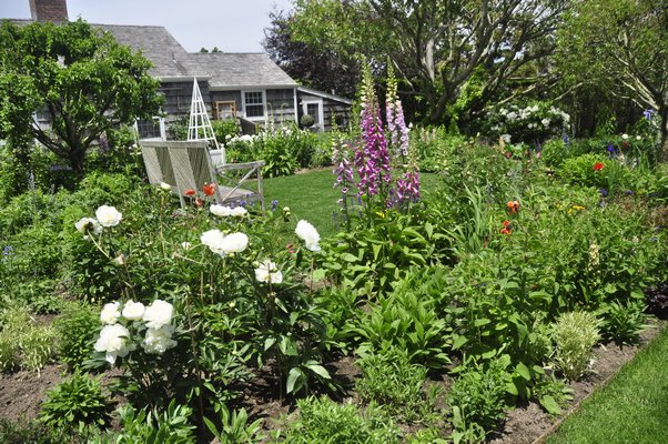 Scenes from Alexandra Munroe's and Robert Rosenkranz's garden in East Hampton. MICHELLE TRAURING