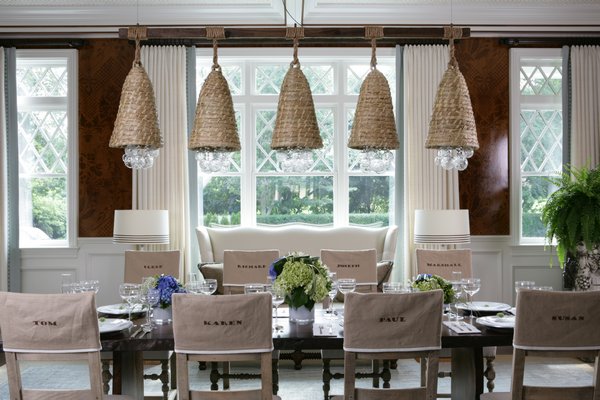 Slipcovers allow designers to add personality to the dining room. Photographer Keith Scott Morton