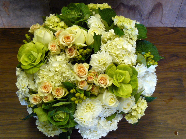 Hydrangea, kale, spray roses, polo roses and green hypericum make up a yellow-green hued bouquet, ideal for spring at Thorn Bird Floral Boutique in Water Mill. COURTESY ROBIN PREIATO