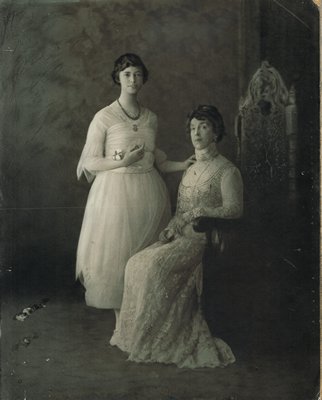 This circa-1900 photograph shows an evolution of style from the formal mother, Julia S. Fitzgerald, who is seated, to her daughter, Dolorita Fitzgerald Wallace, who is dressed in looser clothing of the time. COURTESY SOUTHAMPTON HISTORICAL MUSEUM