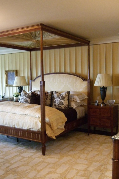 Upholstered walls in a master bedroom.   COURTESY MARSHALL WATSON