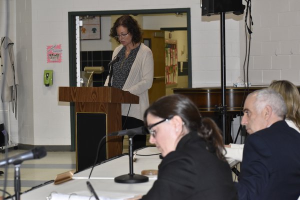 Karen Kooi, co-chair of the East Quogue Village Exploratory Committee, spoke at the public hearing on Monday. VALEIRE GORDON