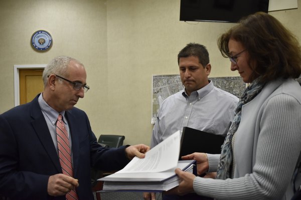 Members of the East Quogue Village Exploratory Committee met with Southampton Town Supervisor Jay Schneiderman on Wednesday to submit a completed petition for the incorporation of East Quogue. VALERIE GORDON