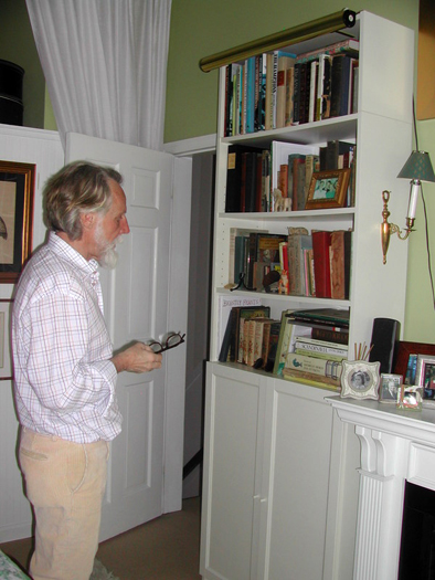 East Hampton resident Paul Vogel a library in nearly every room of his home; the library in the master bedroom contains a small collection of favorite books. BRANDI BUCHMAN