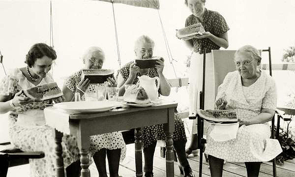 Ladies of War Timber Camp Enjoying Watermelon.
