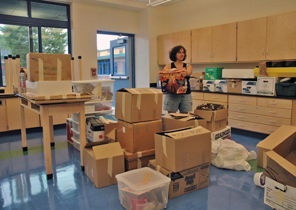 Toni Fioriello sets up her new science lab in the John Marshall Elementary School.