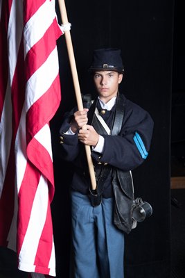 Ethan Suhr as Billy the Flagbearer. MARY GODFREY