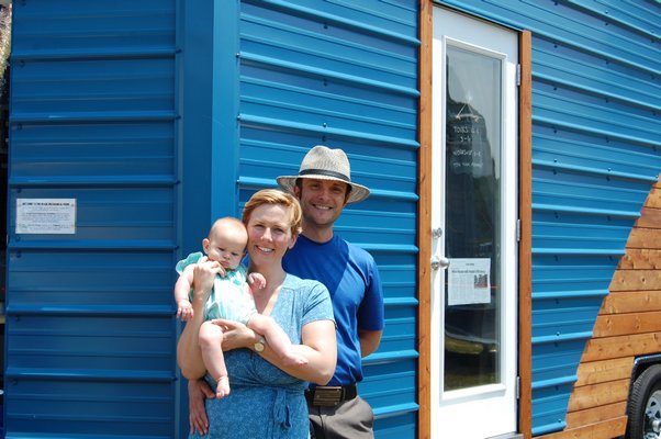 Grace and Corbett Lunsford outside the Tiny Lab with their 4-month-old daughter, Nanette. JON WINKLER