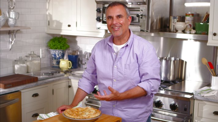 George Hirsch taking his Apple Strawberry Rhubarb Pie out of the oven. HIRSCH MEDIA