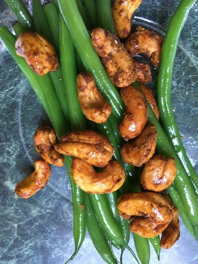 Green beans with curried cashews. JANEEN SARLIN