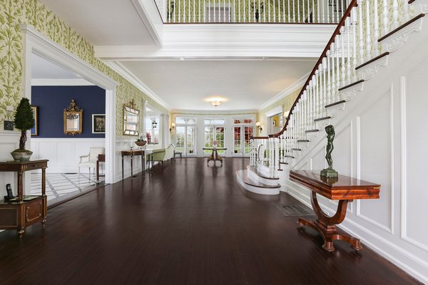 July 2 -- After an extensive three-year renovation, the Rose Manor House in Quogue is back on the market for a whopping $15.5 million. Simon Rose, CEO of Dahlman Rose & Company, a boutique investment firm typically specializing in a peculiar mix of energy, metals, mining and transportation, bought the house back in 2010 for $5.4 million. At that price point, considering that the house had not seen any significant structural renovations since it was first commissioned in 1906 by the Greeff textile family, teardown seemed like the most economically viable option. “Thank God that there are people around like Simon Rose who want to restore architecturally significant houses like these,” said Enzo Morabito, a broker for Douglas Elliman Real Estate, as he toured the house along with a film crew. The interior of the house—and the exterior of Mr. Morabito—can be seen by a national audience on NBC’s “Open House NYC,” which features luxury homes from various highend real estate pockets across the country. Though Mr. Rose originally paid a hefty sum for an out-ofdate structure, the current listing price would suggest that the renovations were as much a shrewd real estate play as they were a preservationist effort. It is “one of the last remaining examples of the extravagant ‘cottages’ of the Gilded Age,” said Mr. Morabito.