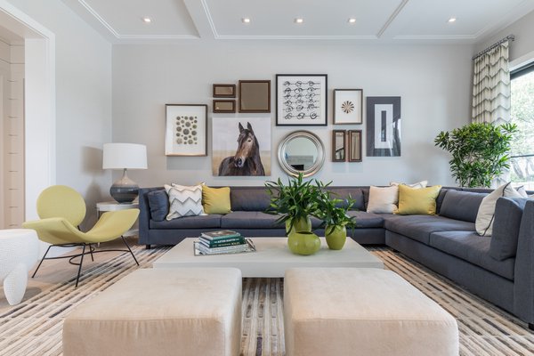 An earshot away from the party in the great room, the living room offers a quieter space with a farm theme at Kristen Farrell's Home Show at 50 Lawrence Court in Water Mill. LENA YAREMENKO