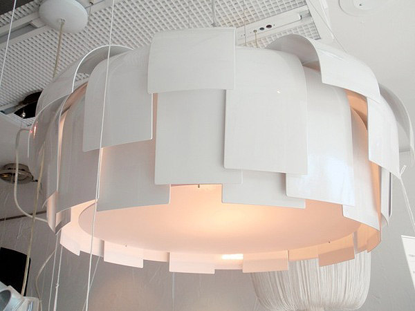 Lampshade in metal armor.   MARSHALL WATSON