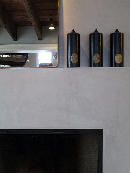 Mirrored fireplace at Monc XIII.   MARSHALL WATSON