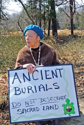 April 11: Members of the Shinnecock Indian Nation mounted a small protest Tuesday morning, objecting to new development in the area of Shinnecock Hills known as Sugar Loaf, which they have long claimed as sacred ancestral territory containing numerous ancient native gravesites.