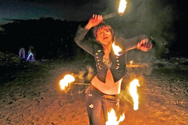 February 14: Samantha Ruddock of The Fiery Sensations performing on Windmill Beach in Sag harbor During HarborFrost.