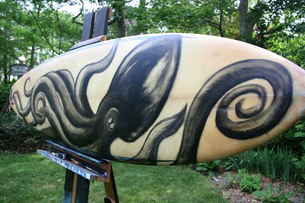 Carolyn Munaco likes to use unexpected "canvases" to paint on like this reclaimed surfboard. COURTESY CAROLYN MUNACO