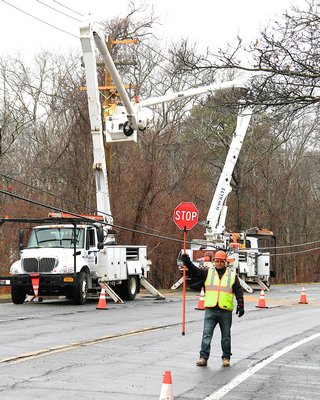 Crews from PSEG worked for hours to repair a utility pole that was knocked down in a single car crash early Tuesday morning. KYRIL BROMLEY